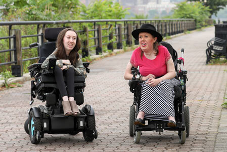 Two Affected with Congenital Muscular Dystrophy Strive for Rare Inclusion