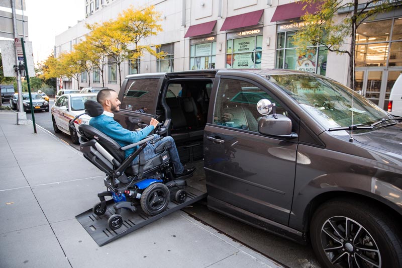 Jose entering his van