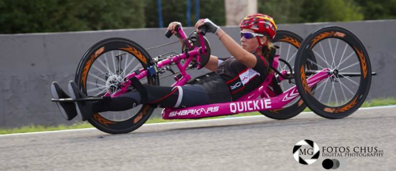 A para-athlete riding a handcycle