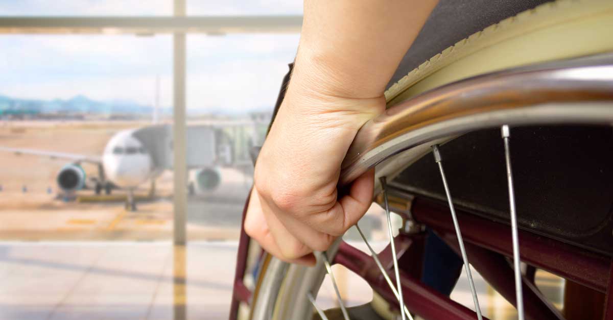 A person who uses a wheelchair at an airport