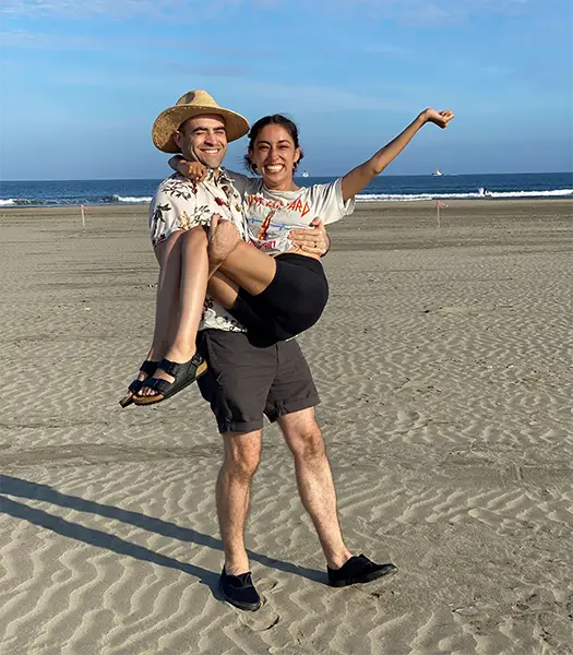 Julia and her husband at the beach