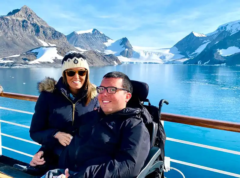 Sandy with her son visiting Antarctica