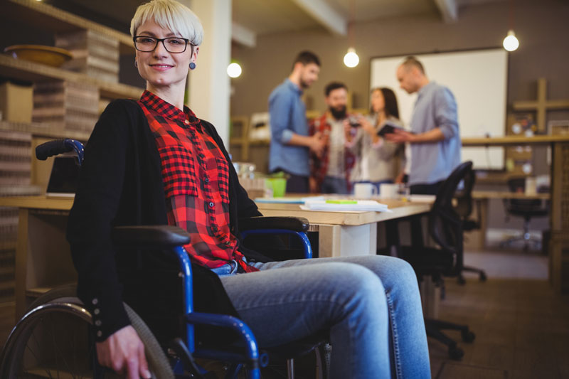 Woman with a disability in an office